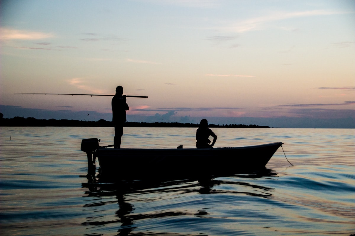 Fisherman during sunset in Rasdhoo - Maldives