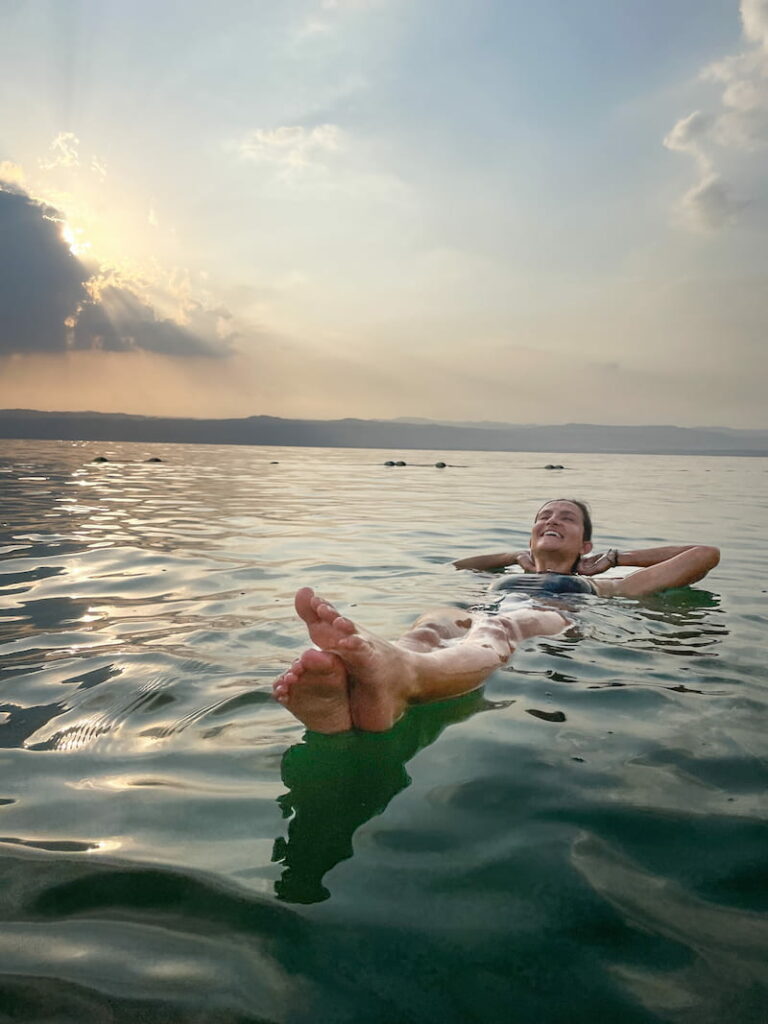 woman relaxing in the waters of the Dead Sea - one of the main tourist attractions in Jordan